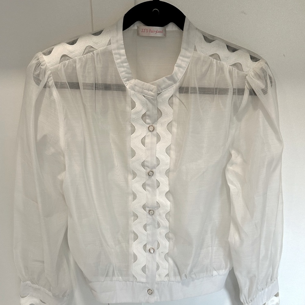 Sheet blouse with ric rac. Labeled Large but fits like S/M. JJ’s Fairyland